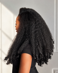 Side profile of Slay Africana showing natural texture